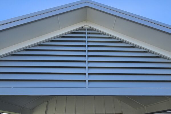 Close up of decorative louvre installed in the peak of a pergola.