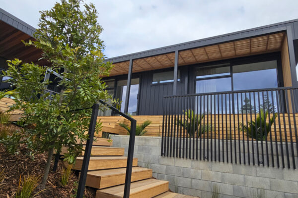 Pergola covering a large rectangular deck.