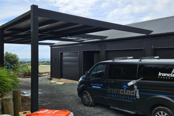 Ironclad van parked under newly installed pergola.