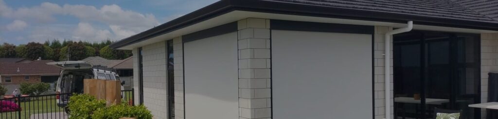 Outdoor blinds offer privacy to a patio.